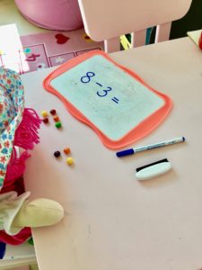fun math game subtracting sweets using toy